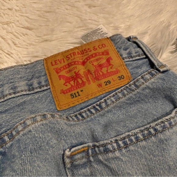 Vintage Levi's 511 Slim Fit Distressed Raw Hem Jeans Light Blue W29 - Picture 11 of 14